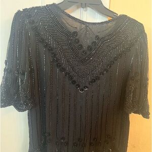 Sequins and beaded blouse.  Very well made size PM. Black